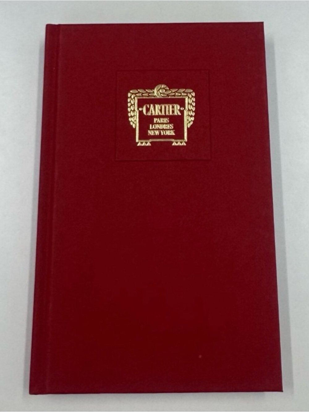 Cartier Red Hardcover with Gold Embossed Crest